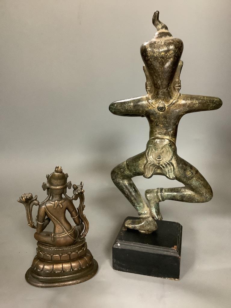 A Nepalese bronze figure of a deity, total height 33.5cm and a copper alloy figure of Green Tara